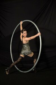 woman standing in cyr wheel denver