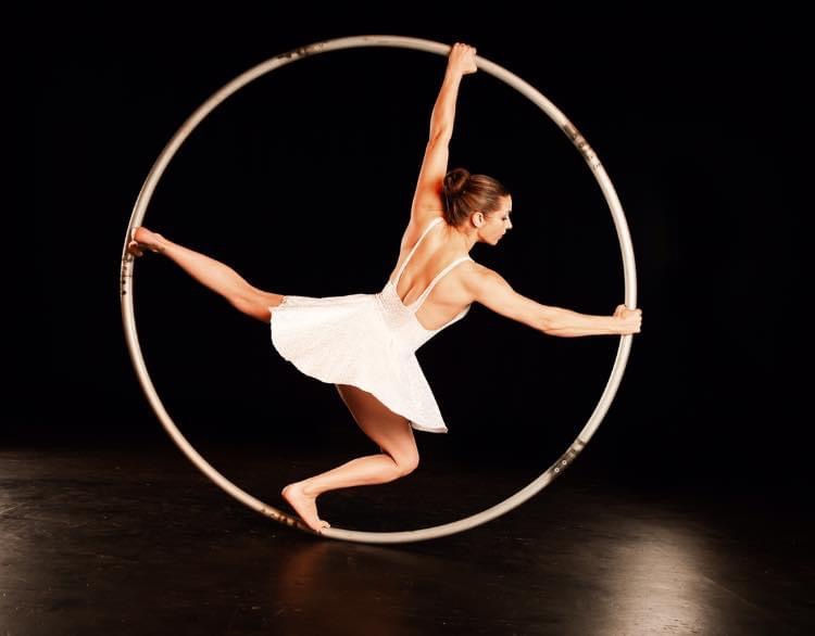 women rotating in cyr wheel denver