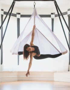 aerial dance rigging from home. aerialist on a hammock using an aerial rig