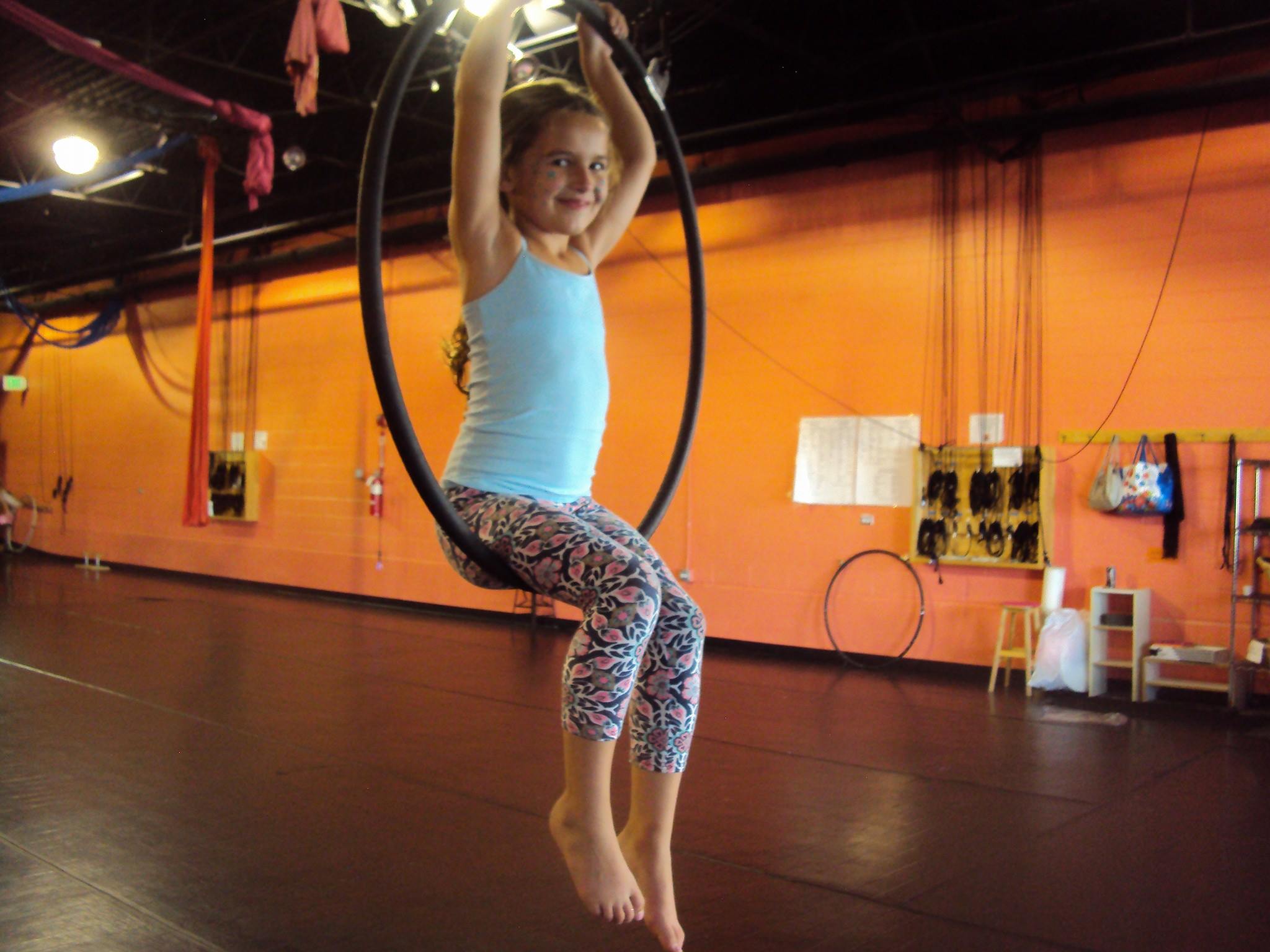 Aerial dance youth student using the hoop Aerial dance youth student using the hoop